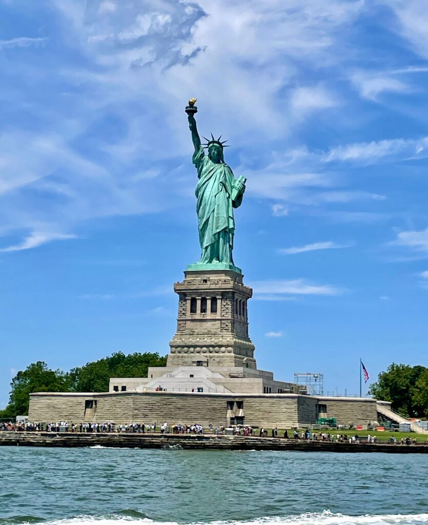 View of the Statue of Liberty from a cruise in New York Harbor.