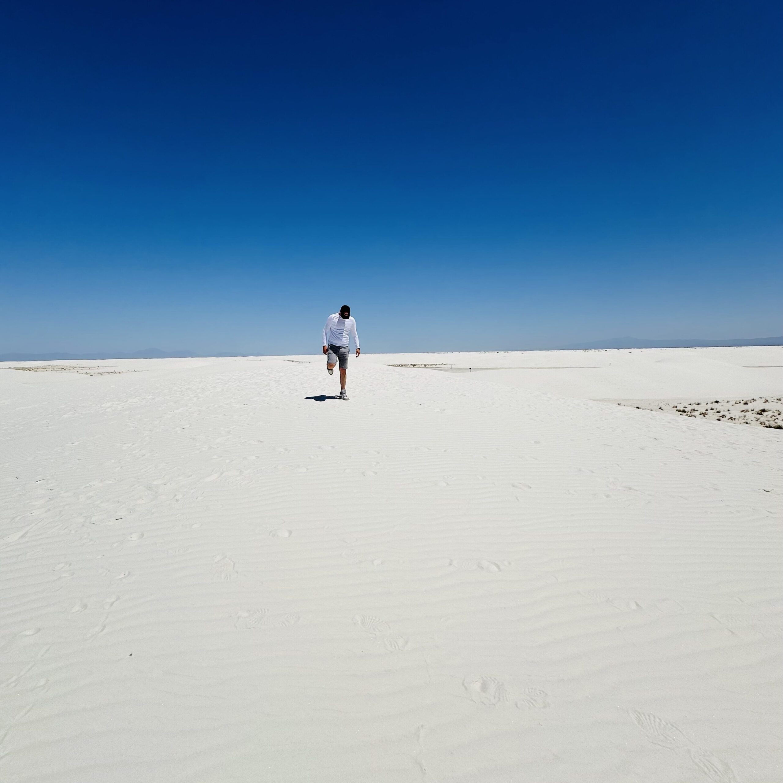 White Sands National Park in New Mexico under a deep blue sky.