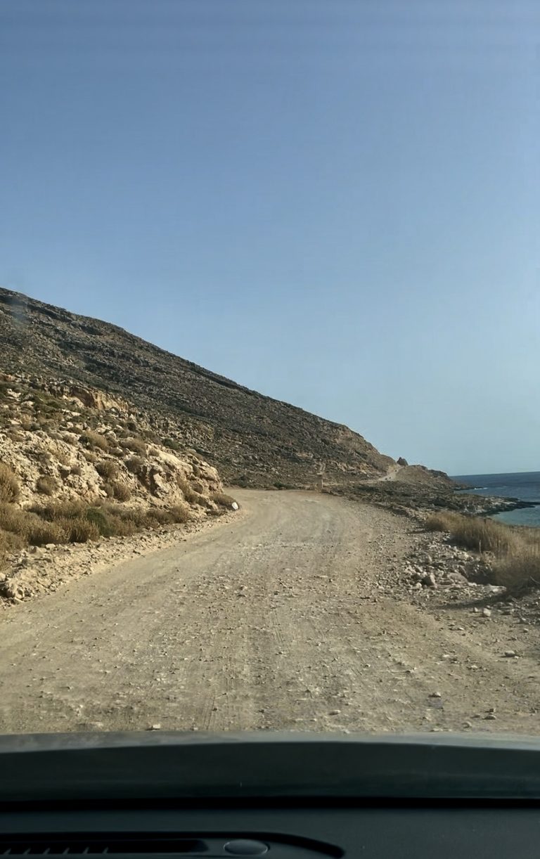 Rough gravel road leading to Balos Beach in Crete, Greece